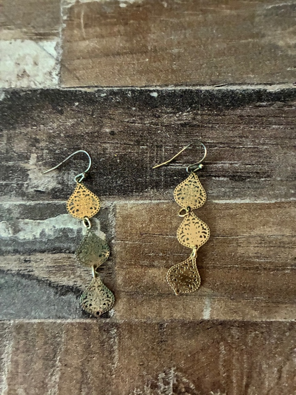 Gold color dangle earrings